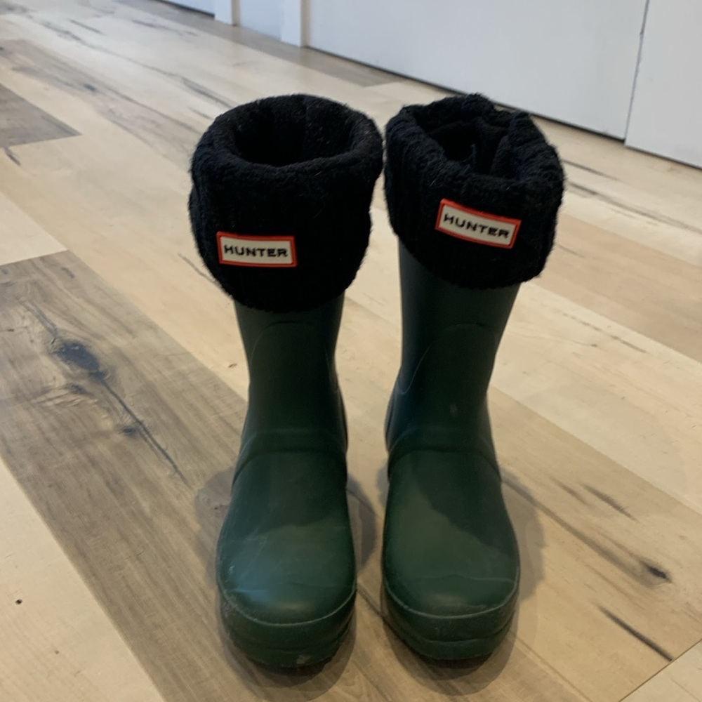 Hunter green original short rain boot with black Hunter socks.